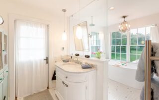 Soaking tub and rain shower are part of the en suite main bathroom at Sunset Farm Stay vacation rental in Crozet Virginia