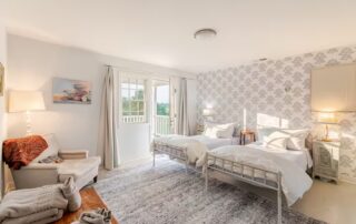 bedroom #2 set up with twin beds and can also be made up as a king bed at Sunset Farm Stay vacation rental in Crozet Virginia