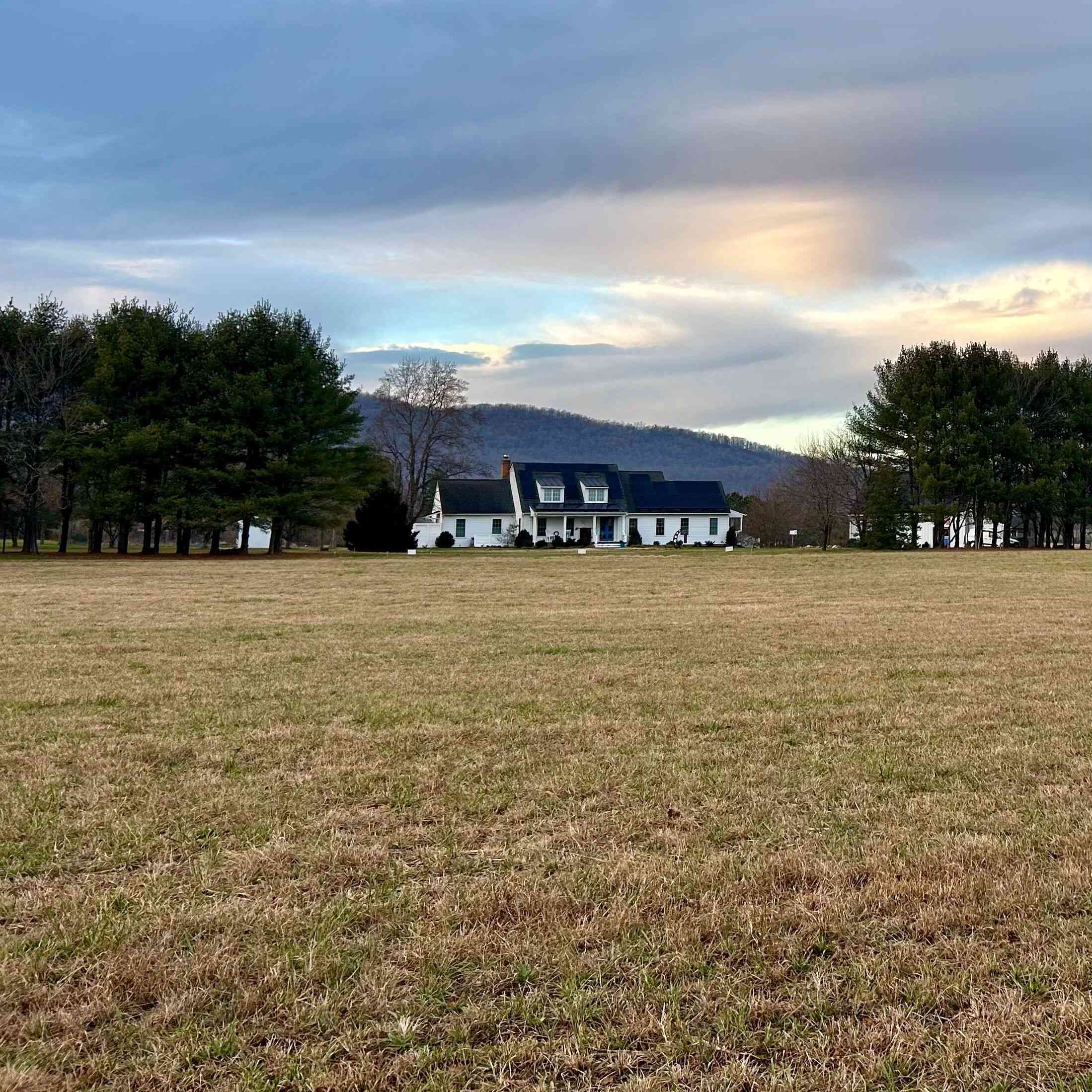 big skies and wide expanses with mountain views at Sunset Farm Bed and Breakfast
