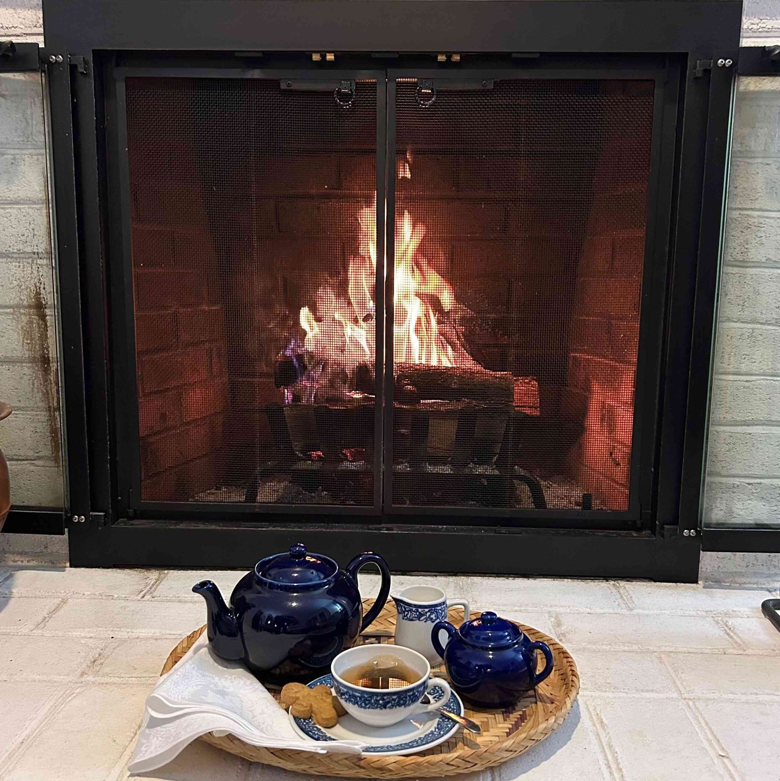 sit by the fire at Sunset Farm Bed and Breakfast