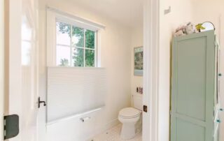 Private commode in the main bath at Sunset Farm Stay vacation rental in Crozet Virginia