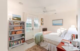 bedroom #3 has a door out onto the Virginia Farm porch at Sunset Farm Stay vacation rental in Crozet Virginia