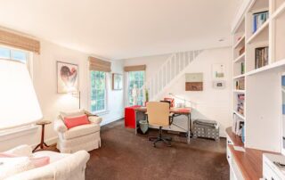 office has a well-lit desk and chairs for reading or quiet conversations at Sunset Farm Stay vacation rental in Crozet Virginia