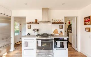 Gas range with convection oven and warming oven in the Kitchen at Sunset Farm Stay vacation rental in Crozet Virginia.