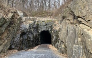 The Blue Ridge Tunnel is a historic railroad tunnel built during the construction of the Blue Ridge Railroad in the 1850s. A favorite day trip for visitors to Sunset Farm Stay.